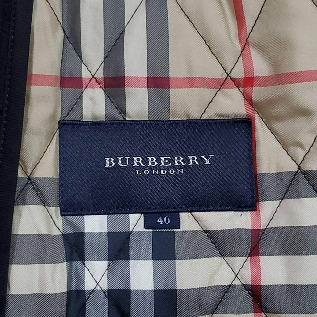 BURBERRY(バーバリー)の数回使用 L バーバリー キルティング コート 黒 ノバチェック 40 フード レディースのジャケット/アウター(ロングコート)の商品写真