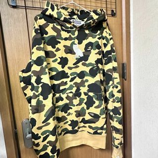 アベイシングエイプ(A BATHING APE)のBape × OVO 1st camo サンドイエローパーカー(パーカー)