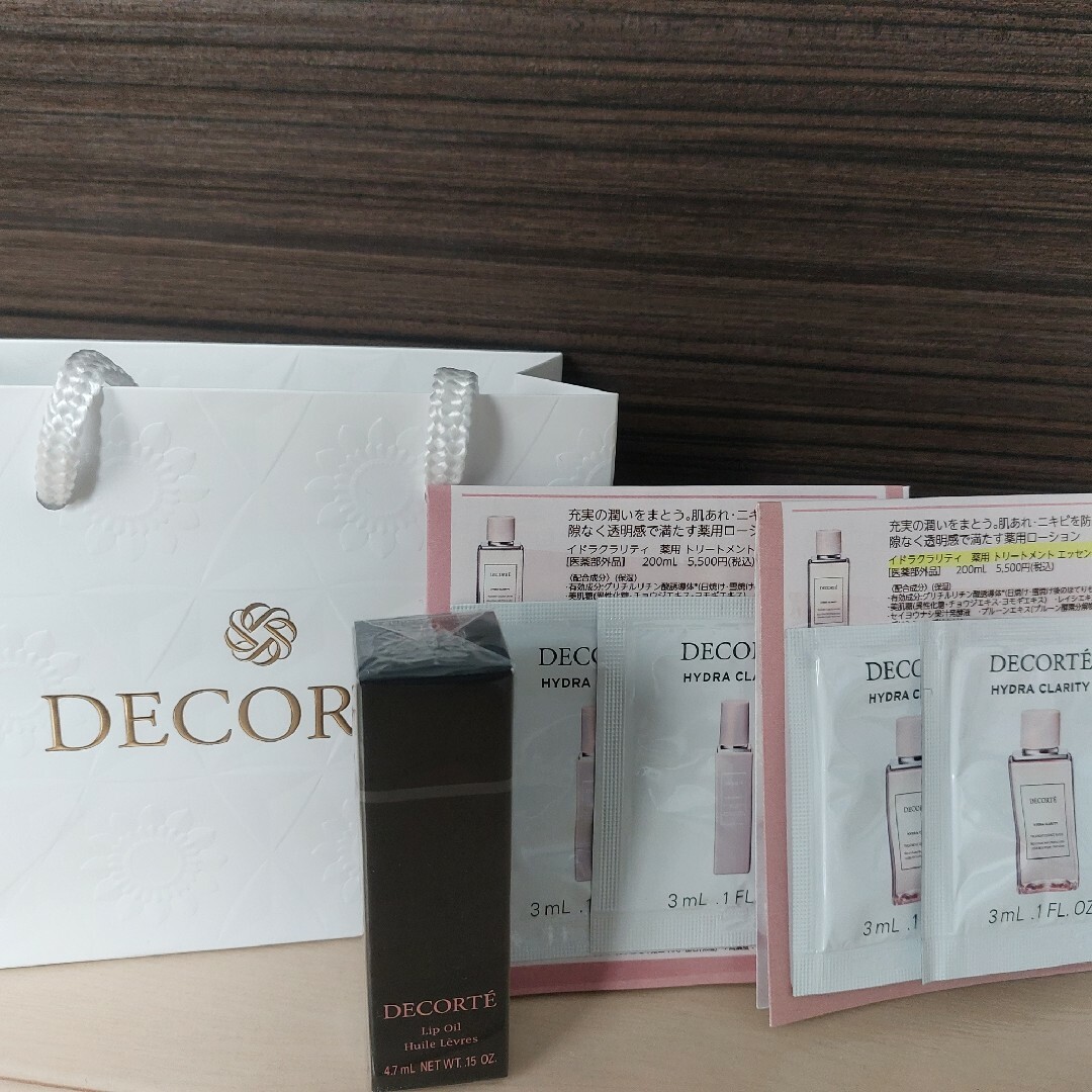 COSME DECORTE(コスメデコルテ)のコスメデコルテ　リップオイル01　white jasmine コスメ/美容のベースメイク/化粧品(リップグロス)の商品写真