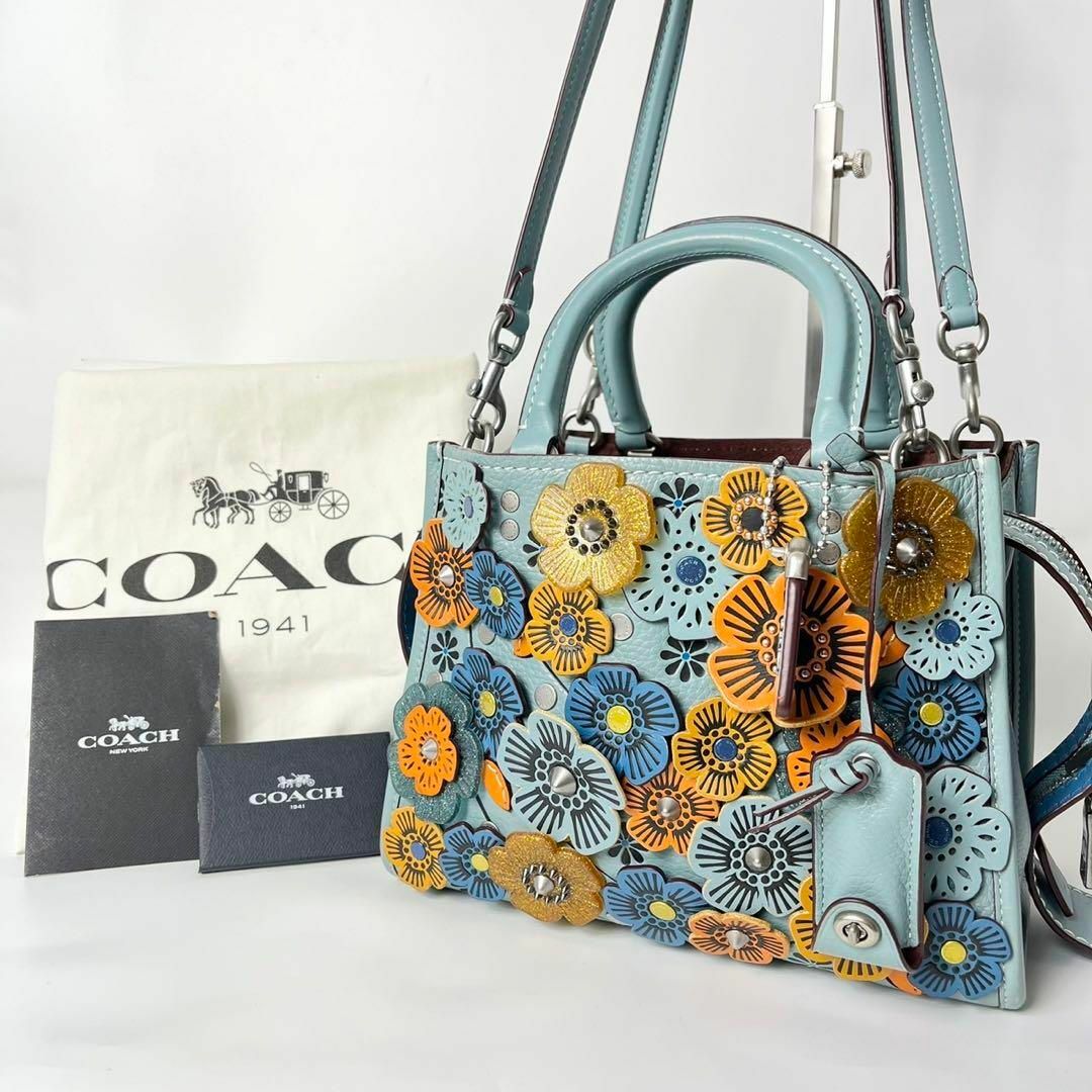 COACH(コーチ)の【美品・保存袋】コーチ ローグ25 ティーローズ ライトブルー　グラブタンレザー レディースのバッグ(ハンドバッグ)の商品写真