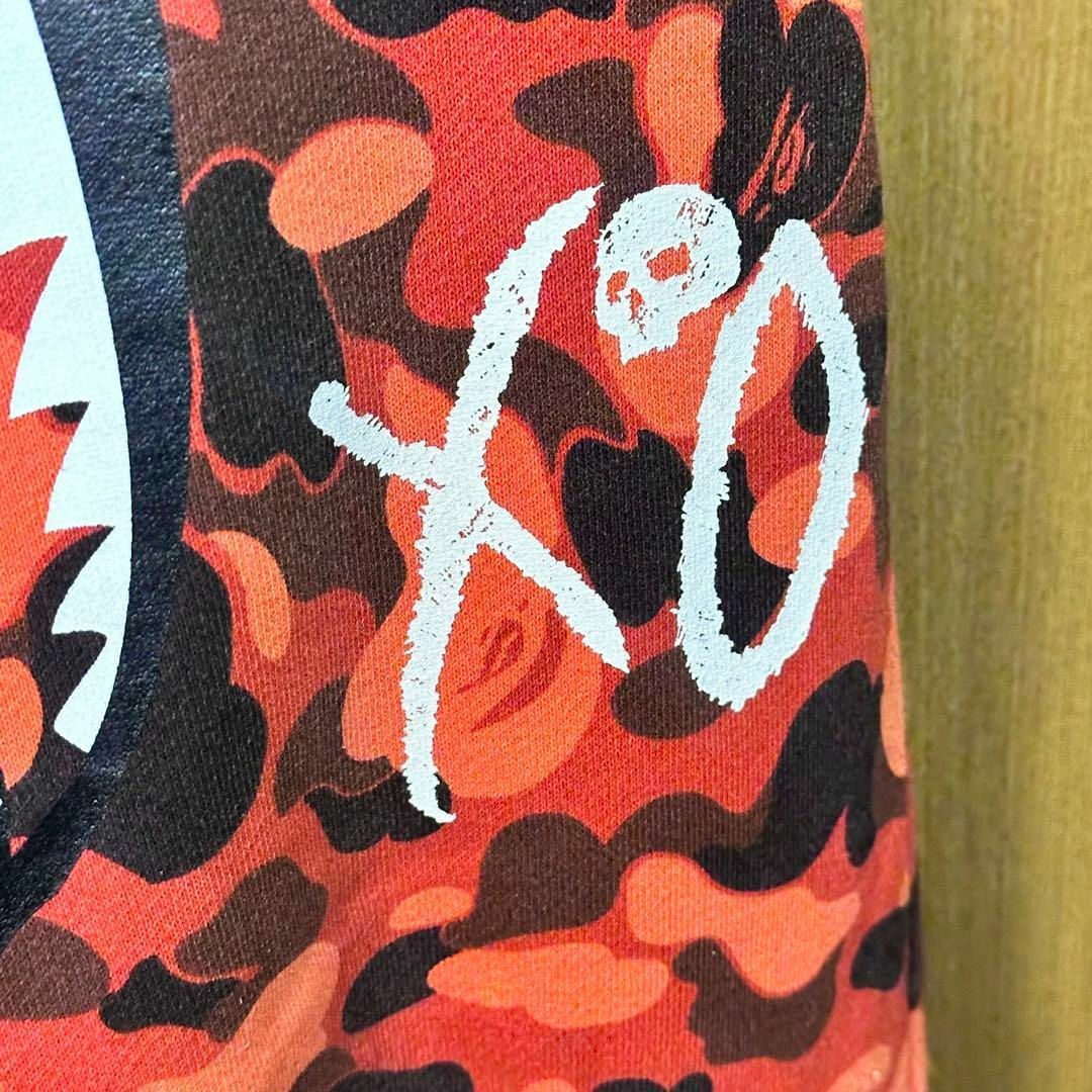 A BATHING APE(アベイシングエイプ)のBape XO orange camo track pants メンズのパンツ(その他)の商品写真