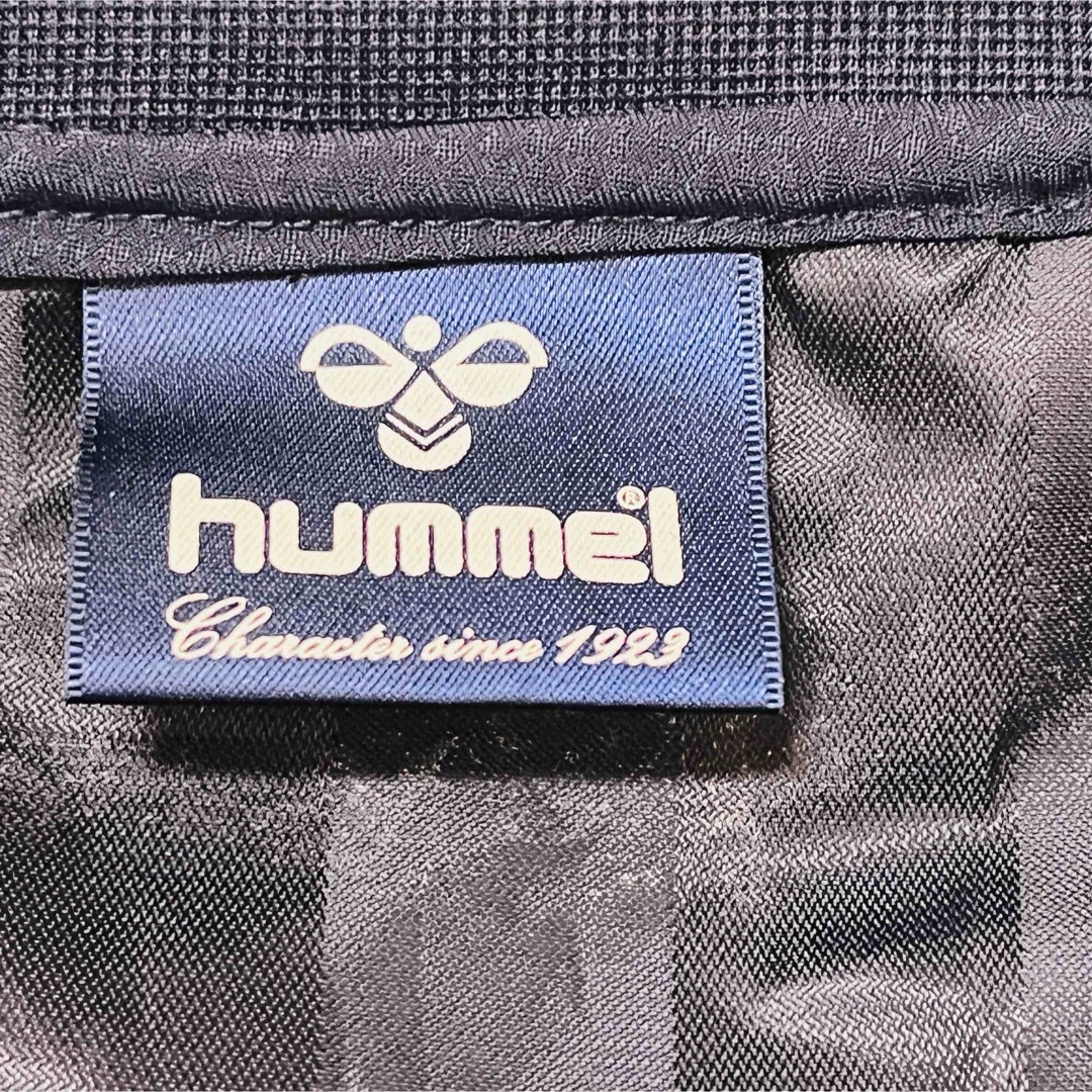 hummel(ヒュンメル)のヒュンメルピステウインドブレーカー　プルオーバー　M ネイビー×オレンジ×金ロゴ メンズのジャケット/アウター(ナイロンジャケット)の商品写真