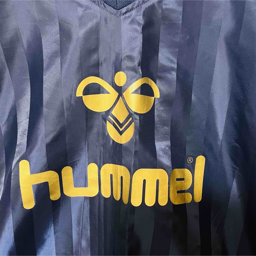 hummel(ヒュンメル)のヒュンメルピステウインドブレーカー　プルオーバー　M ネイビー×オレンジ×金ロゴ メンズのジャケット/アウター(ナイロンジャケット)の商品写真