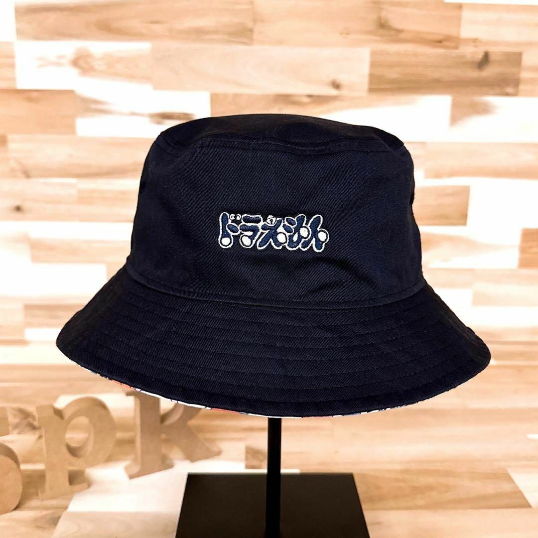 NEW ERA(ニューエラー)のレア【ニューエラ×ドラえもん】限定コラボ リバーシブル ハット 紺×カラフル メンズの帽子(ハット)の商品写真