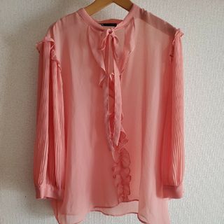 ザラ(ZARA)のZARA Ｌサイズ シースルーオレンジのブラウス トップス フリル リボン 長袖(シャツ/ブラウス(長袖/七分))