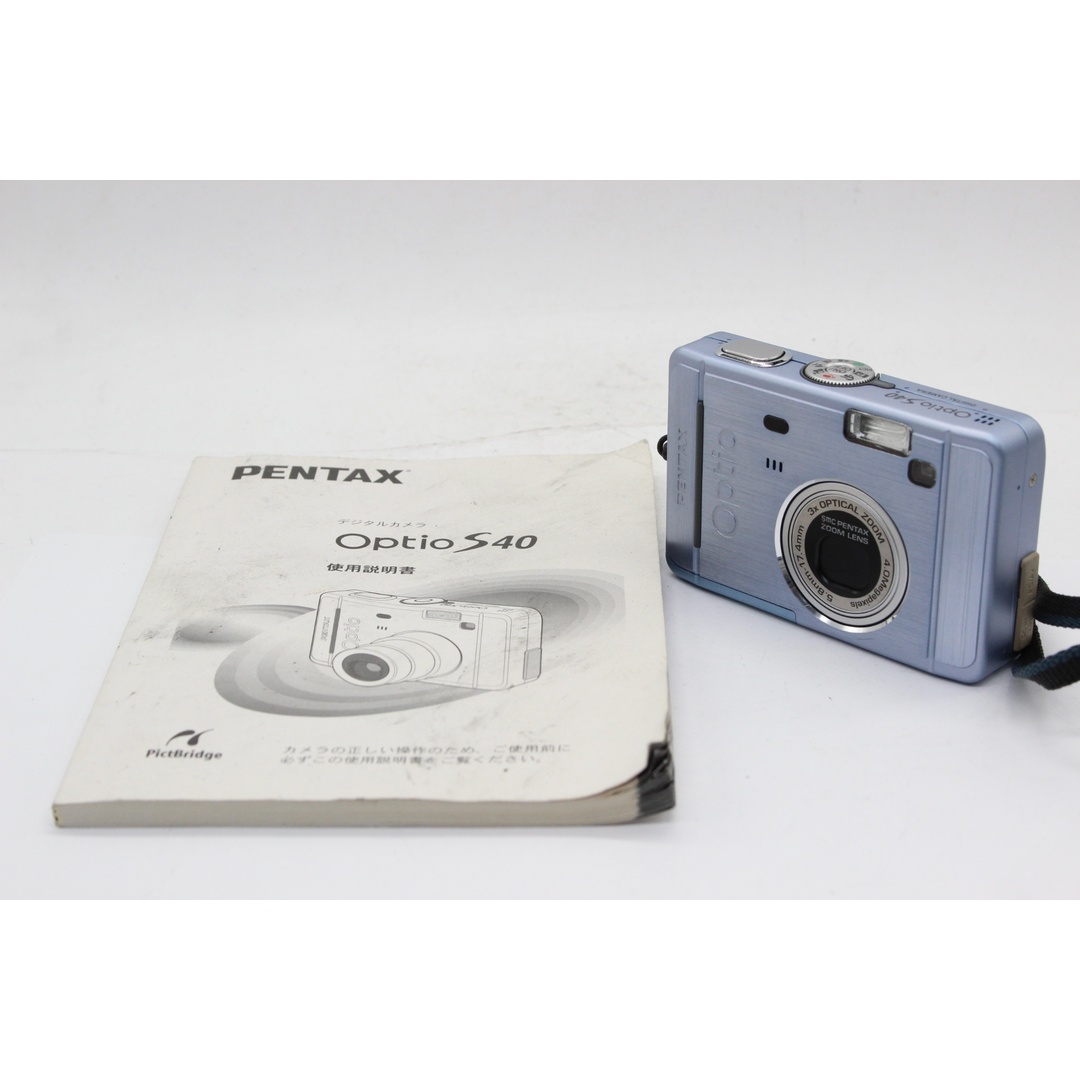 【美品 返品保証】 【便利な単三電池で使用可】ペンタックス Pentax Optio S40 ブルー 3x 説明書付き コンパクトデジタルカメラ  s6677 | フリマアプリ ラクマ