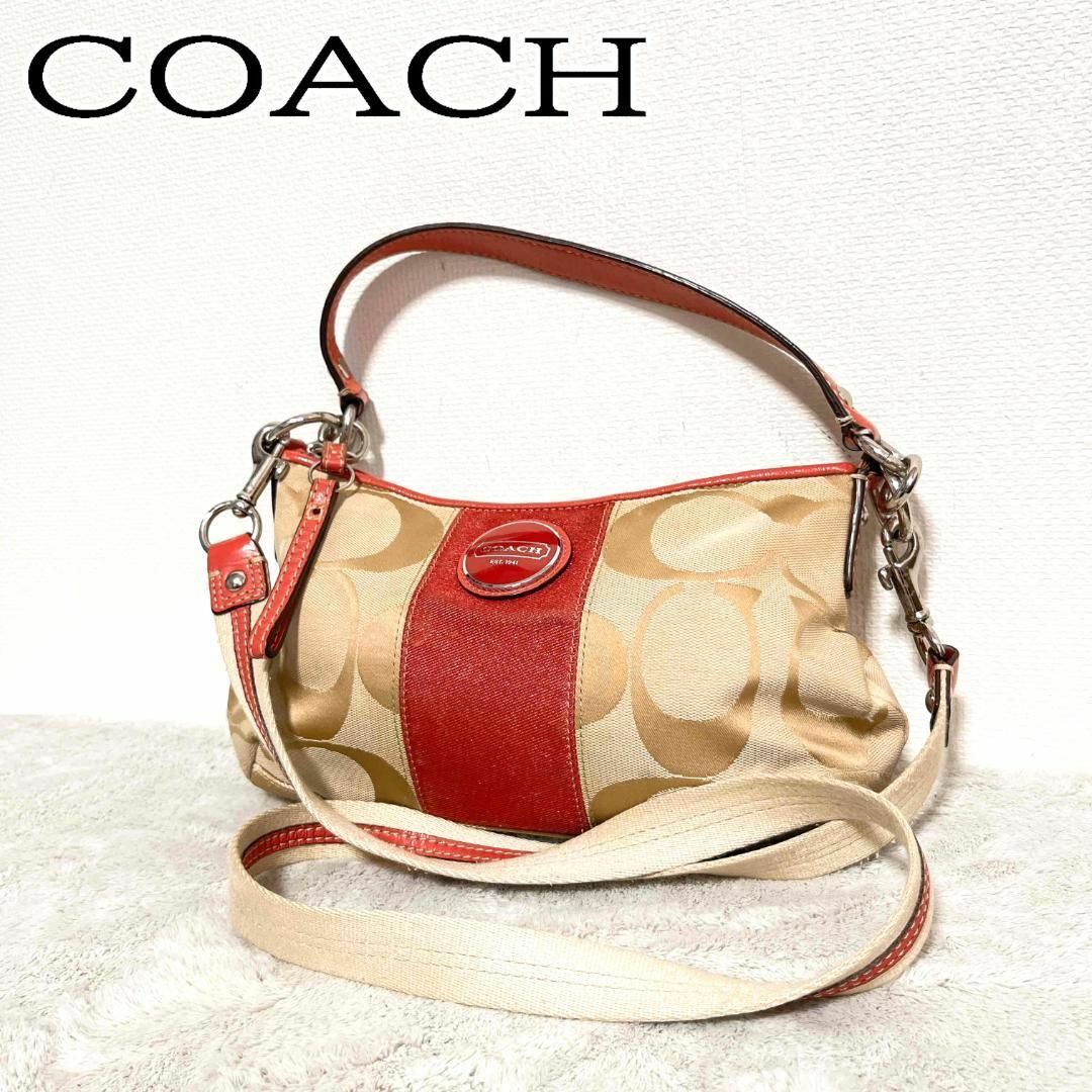 COACH(コーチ)の美品✨COACH コーチショルダーバッグハンドバッグベージュオレンジシグネチャー レディースのバッグ(ショルダーバッグ)の商品写真