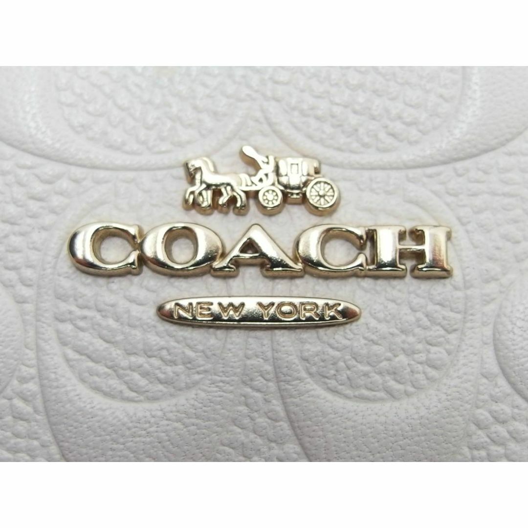 COACH(コーチ)の美品★COACH コーチ シグネチャー F67555 ホワイト レザー ポーチ レディースのファッション小物(ポーチ)の商品写真