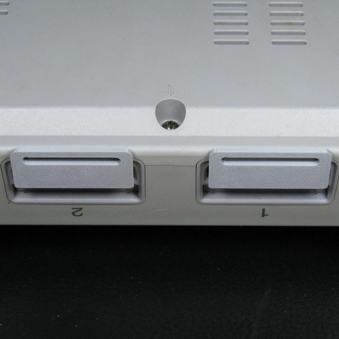 PS1 コントローラー端子用ダストカバー エンタメ/ホビーのゲームソフト/ゲーム機本体(その他)の商品写真