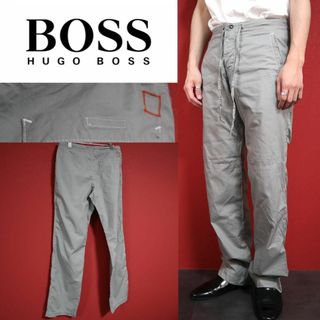 ヒューゴボス(HUGO BOSS)の【モード】HUGO BOSS オレンジ刺繍デザイン ステッチ グレー パンツ(ワークパンツ/カーゴパンツ)