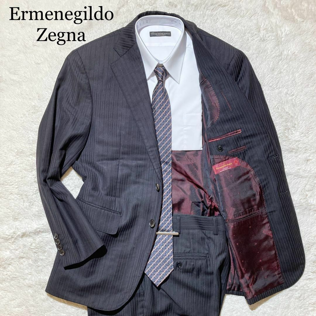 Ermenegildo Zegna(エルメネジルドゼニア)の【極美品】エルメネジルドゼニア スーツ オーダーメイド 黒 ストライプ 赤黒 L メンズのスーツ(セットアップ)の商品写真