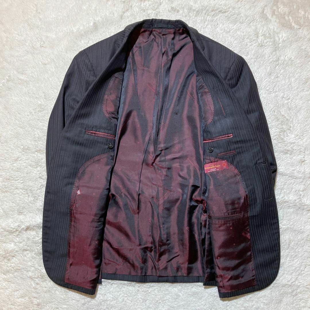 Ermenegildo Zegna(エルメネジルドゼニア)の【極美品】エルメネジルドゼニア スーツ オーダーメイド 黒 ストライプ 赤黒 L メンズのスーツ(セットアップ)の商品写真