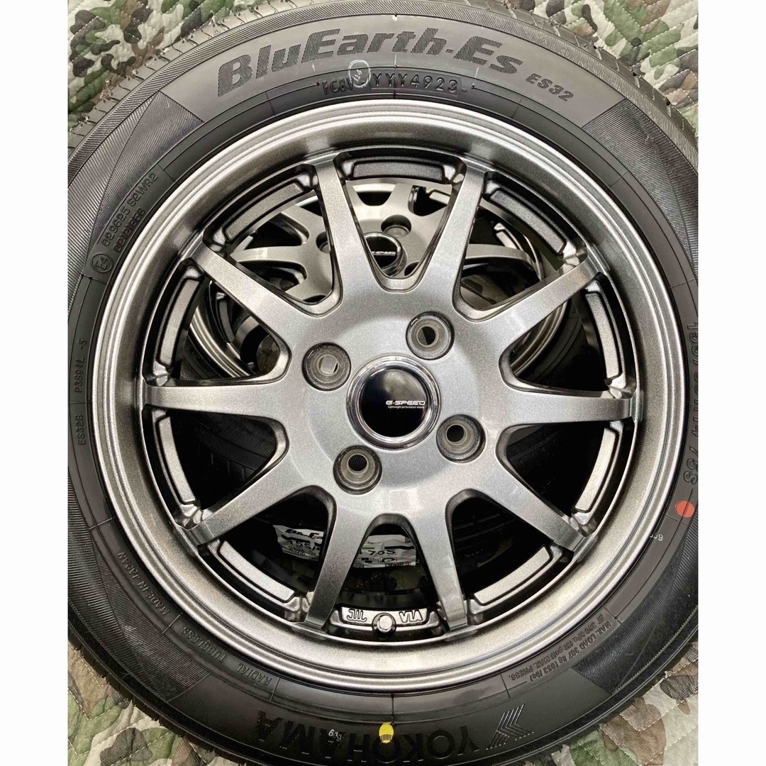 ヨコハマ(ヨコハマ)の⑱155/65R14新品ヨコハマタイヤ4本と中古美品ホイールとナット付き 自動車/バイクの自動車(タイヤ・ホイールセット)の商品写真