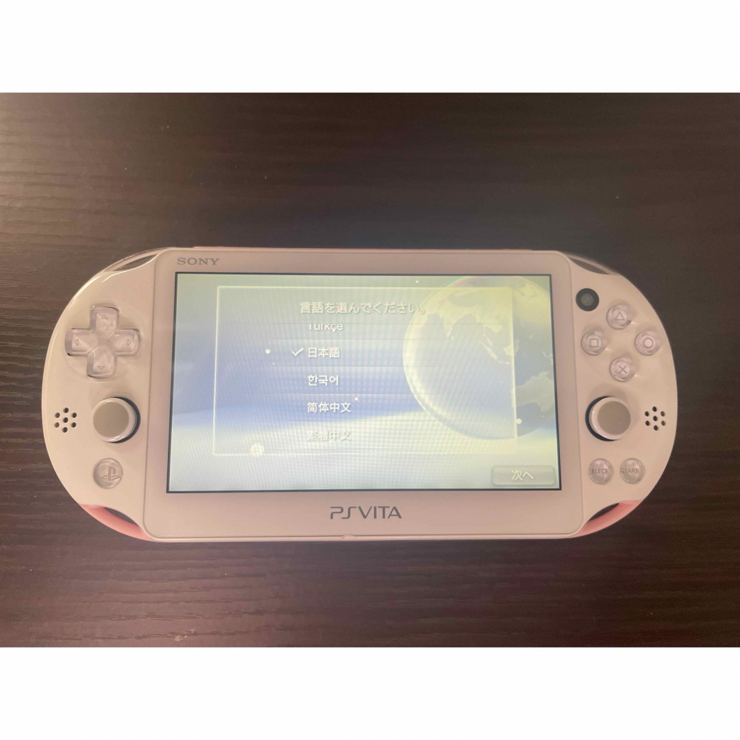 PlayStation Vita(プレイステーションヴィータ)のPSVITA ライトピンク　ソフトセット　動作確認済み エンタメ/ホビーのゲームソフト/ゲーム機本体(家庭用ゲーム機本体)の商品写真