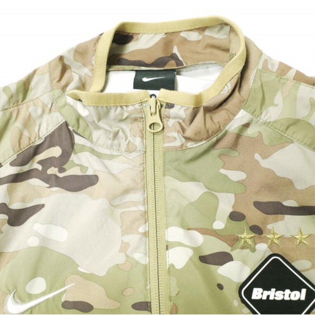 F.C.R.B.(エフシーアールビー)のF.C.R.B. x NIKE エフシーアールビー ナイキ 別注 CAMOUFLAGE REVOLUTION JACKET カモフラージュ レボリューションジャケット 716127-240 M KHAKI F.C.Real Bristol ブリストル スウォッシュ アウター【中古】【F.C.R.B. × NIKE】 メンズのジャケット/アウター(ナイロンジャケット)の商品写真