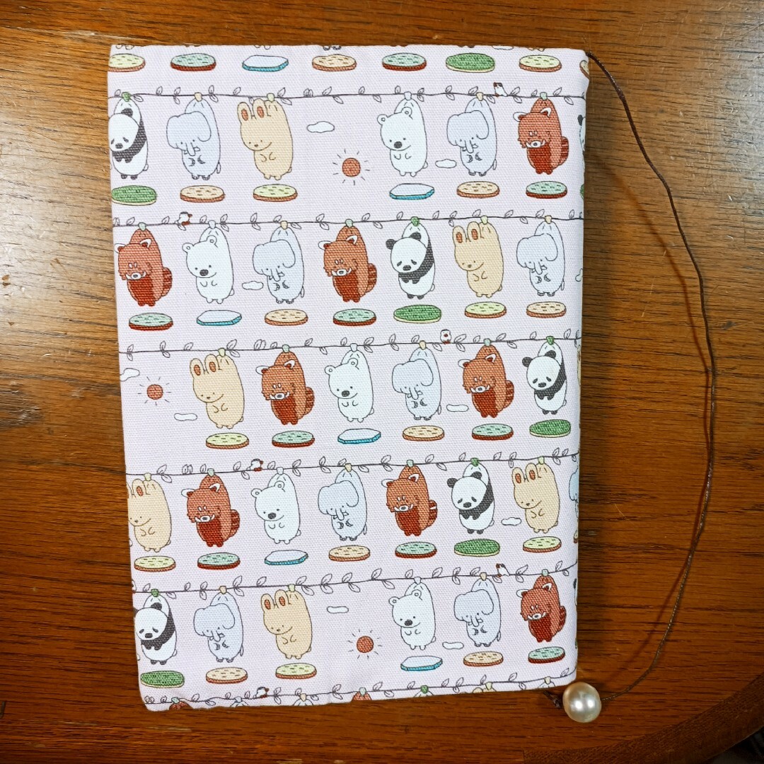 単行本ブックカバー♡洗濯日和 ハンドメイドの文具/ステーショナリー(ブックカバー)の商品写真