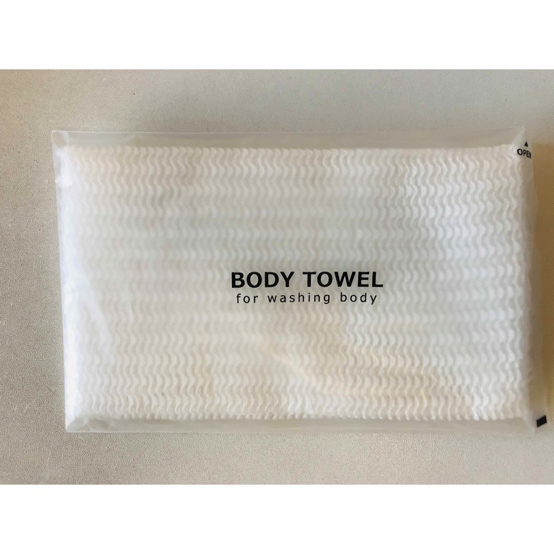 使い捨てボディタオル　ボディータオル　BODY TOWEL    １２個セット インテリア/住まい/日用品の日用品/生活雑貨/旅行(タオル/バス用品)の商品写真