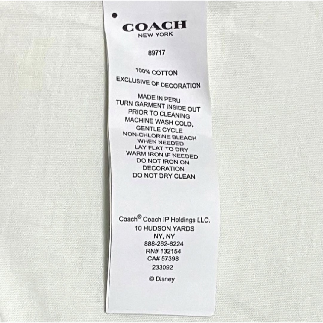 COACH(コーチ)の【希少】COACH×Disney　コラボTシャツ　ピノキオ　馬車ロゴ　ワッペン メンズのトップス(Tシャツ/カットソー(半袖/袖なし))の商品写真