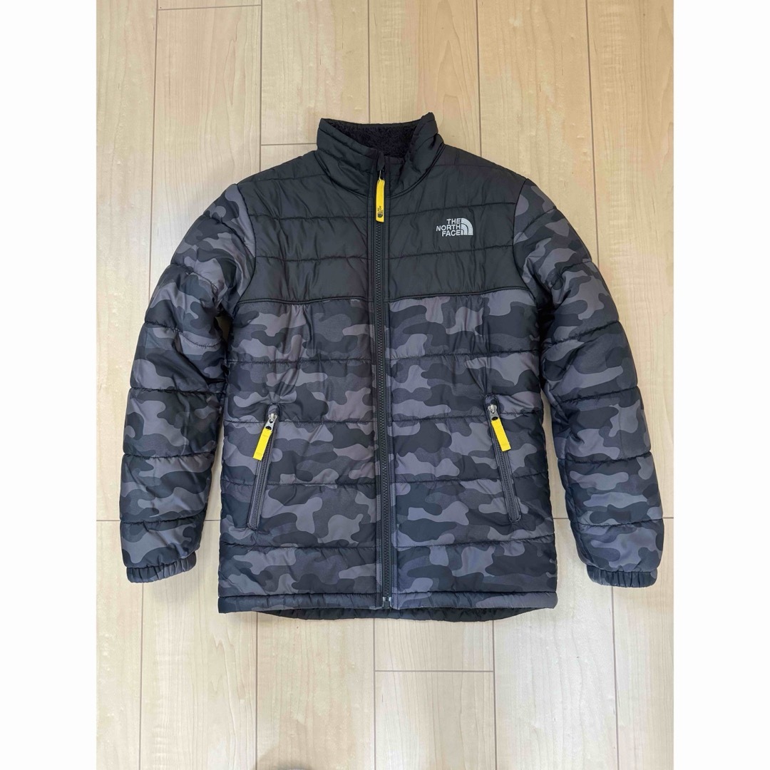 THE NORTH FACE(ザノースフェイス)のノースフェイス　リバーシブルダウンM(10/12) キッズ/ベビー/マタニティのキッズ服男の子用(90cm~)(ジャケット/上着)の商品写真