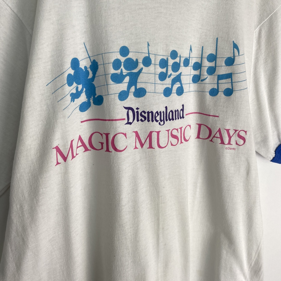 Disney(ディズニー)の【ディズニー　半袖Ｔシャツ　ヴィンテージ　リンガーＴシャツ　白　青　古着】 メンズのトップス(Tシャツ/カットソー(半袖/袖なし))の商品写真