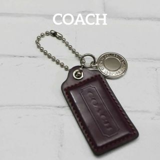 コーチ(COACH)の【匿名配送】COACH コーチ キーホルダー シルバー タグ ロゴ 紫(チャーム)