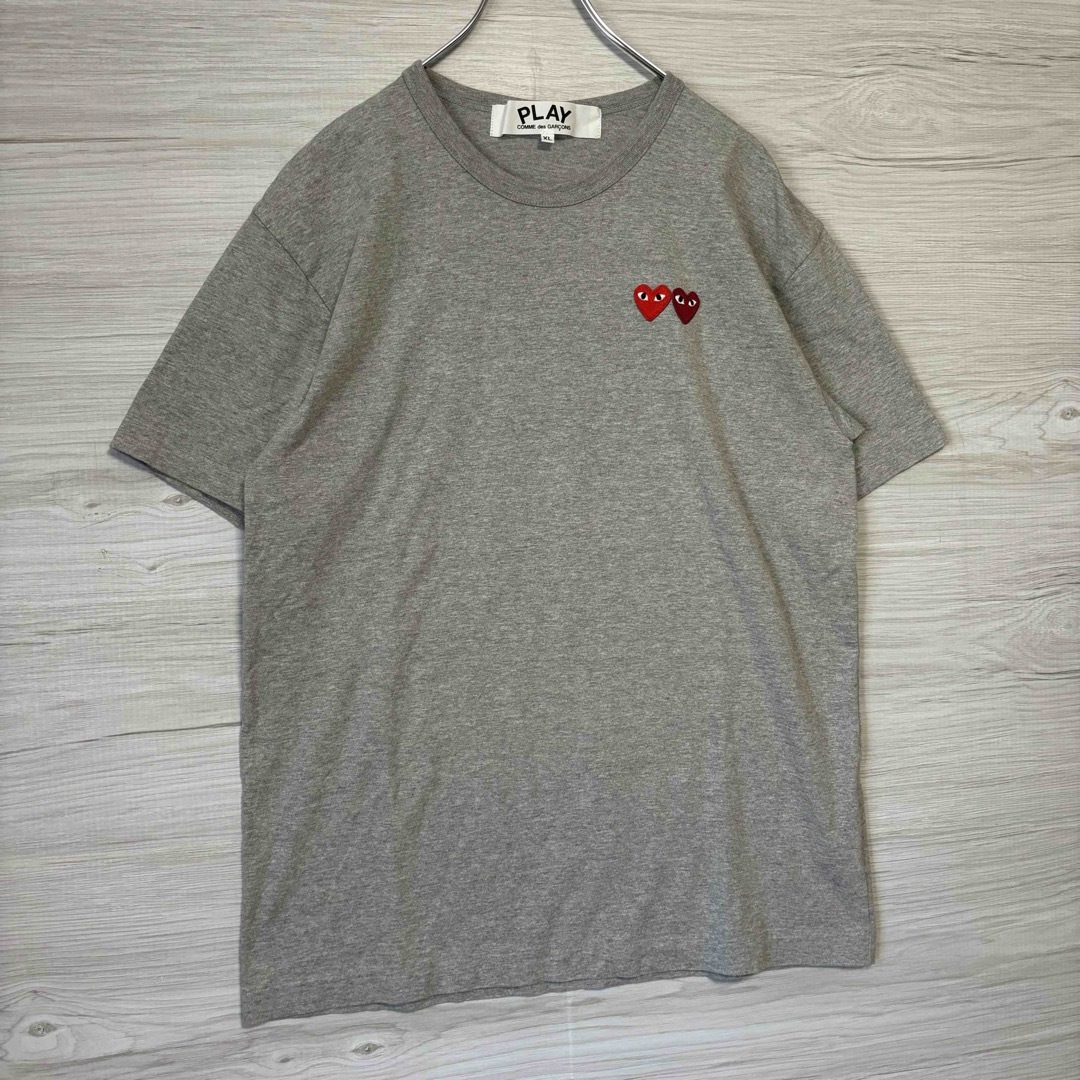 COMME des GARCONS(コムデギャルソン)の【定番デザイン】プレイコムデギャルソン　Tシャツ　ダブルハート　ワンポイントロゴ メンズのトップス(Tシャツ/カットソー(半袖/袖なし))の商品写真