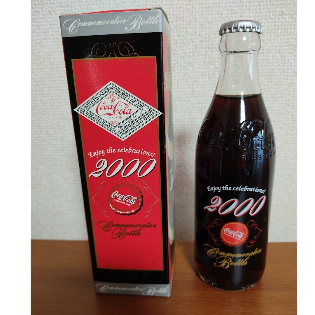 コカ・コーラ(コカコーラ)のコカ・コーラ 2000年記念 ミレニアムボトル 2本セット エンタメ/ホビーのコレクション(ノベルティグッズ)の商品写真