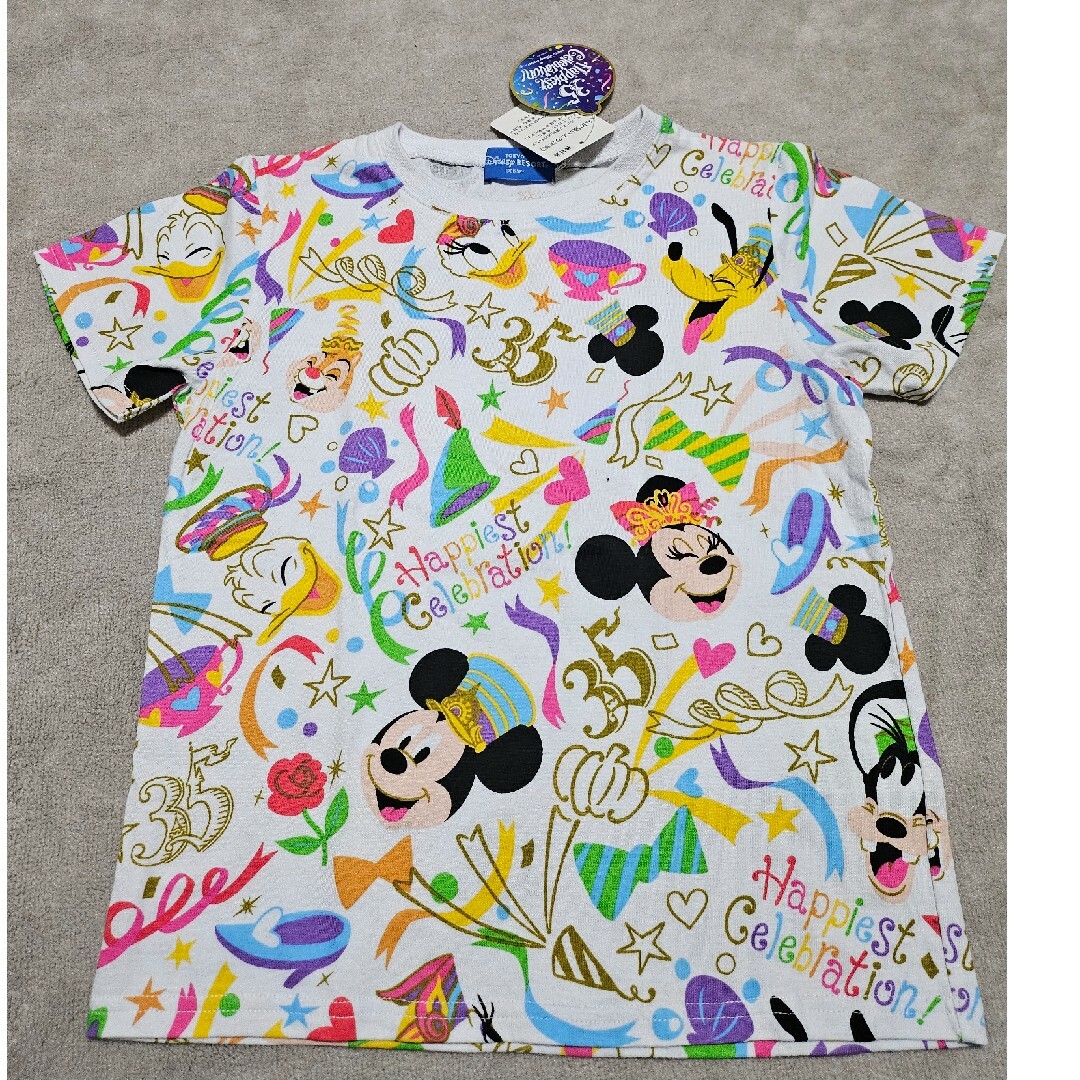 Disney(ディズニー)の東京ディズニーランド　35周年記念Tシャツ　タグ付き キッズ/ベビー/マタニティのキッズ服女の子用(90cm~)(Tシャツ/カットソー)の商品写真