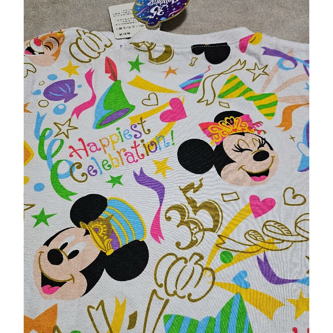 Disney(ディズニー)の東京ディズニーランド　35周年記念Tシャツ　タグ付き キッズ/ベビー/マタニティのキッズ服女の子用(90cm~)(Tシャツ/カットソー)の商品写真