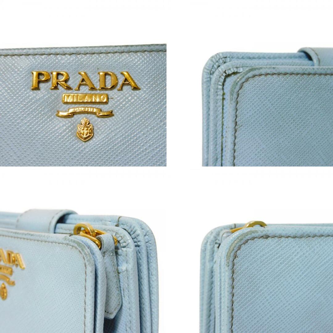 PRADA(プラダ)のPRADA プラダ サフィアーノ マルティック コンパクト ウォレット 現行 スナップボタン セレステ オンダ ライトブルー マルチカラー コンビカラー バイカラー RFID ICチップ ロゴ メタル 二つ折り財布 1ML018 ZLP F02T0 レディースのファッション小物(財布)の商品写真