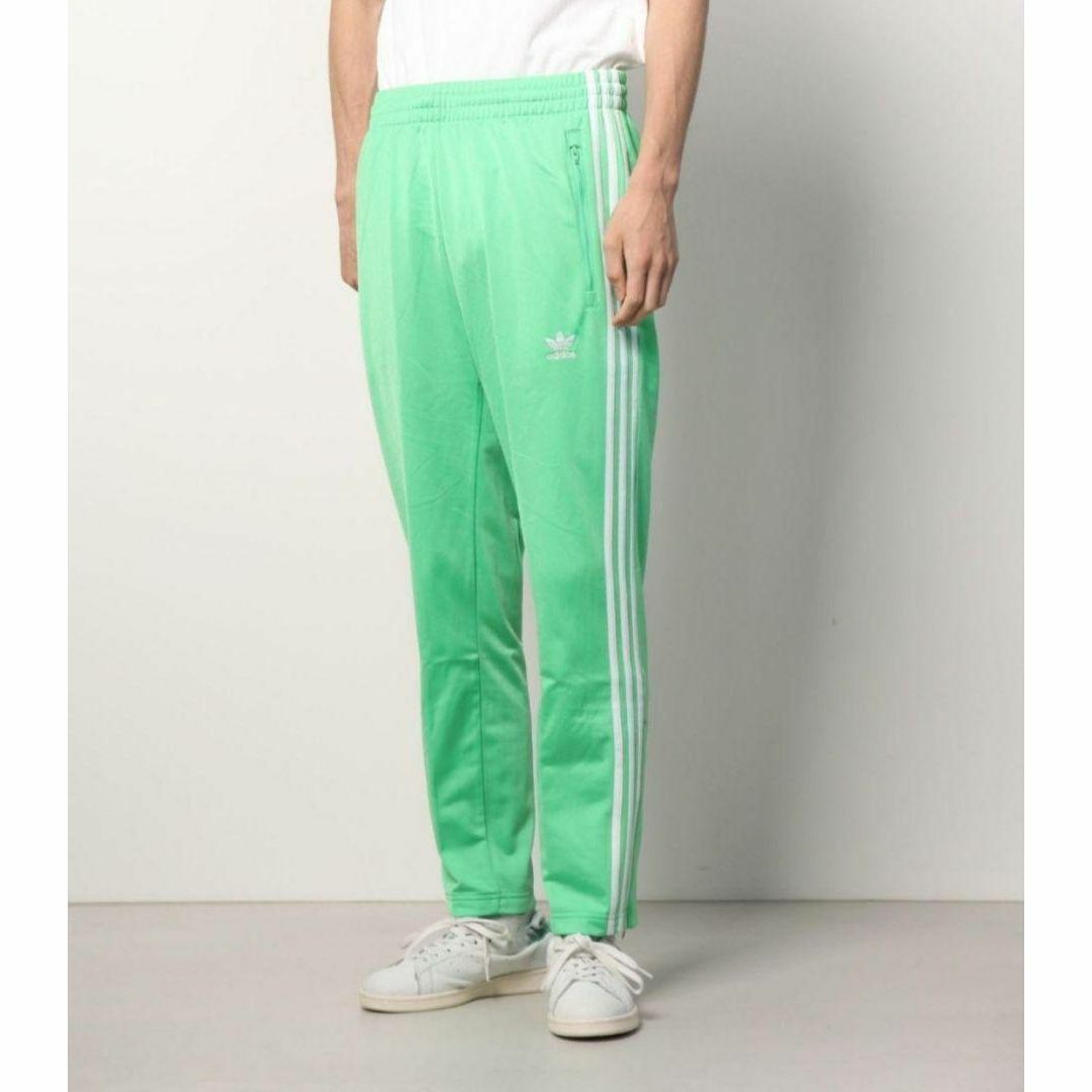 Originals（adidas）(オリジナルス)の新品 アディダス ファイヤーバード 薄緑 トラックパンツ ジャージ 男性XS メンズのパンツ(その他)の商品写真