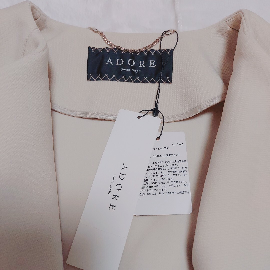 ADORE(アドーア)の新品タグ付き☆高級ライン アドーアノーカラーガウンコート 38 M アイボリー レディースのジャケット/アウター(ロングコート)の商品写真