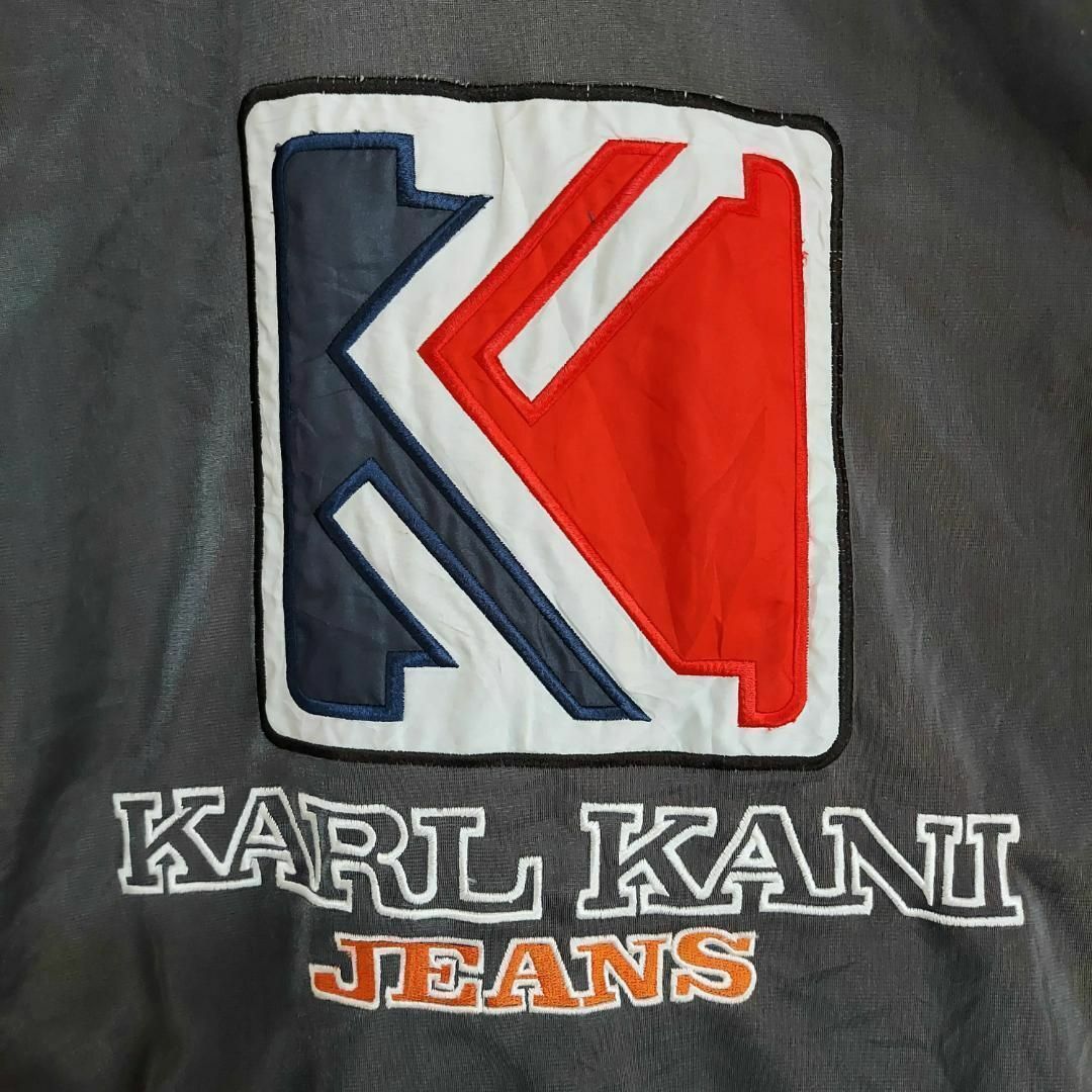 Karl Kani(カールカナイ)のカールカナイ 袖ロゴテープ トラックジャケット ロゴ刺繍 M グレー 黒 赤 メンズのトップス(ジャージ)の商品写真