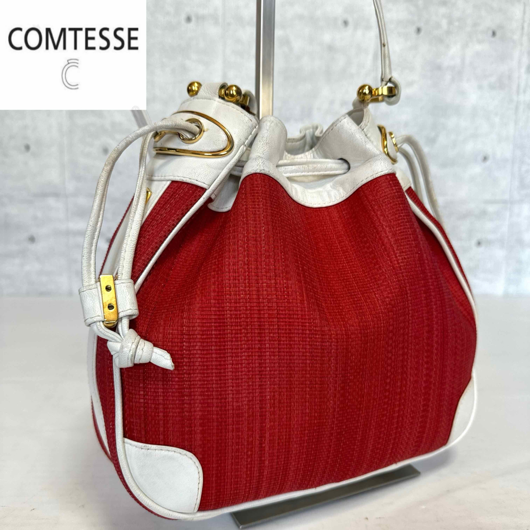 COMTESSE(コンテス)の【COMTESSE】ホースヘア×レザー レッド×ホワイト 巾着 ショルダーバッグ レディースのバッグ(ショルダーバッグ)の商品写真