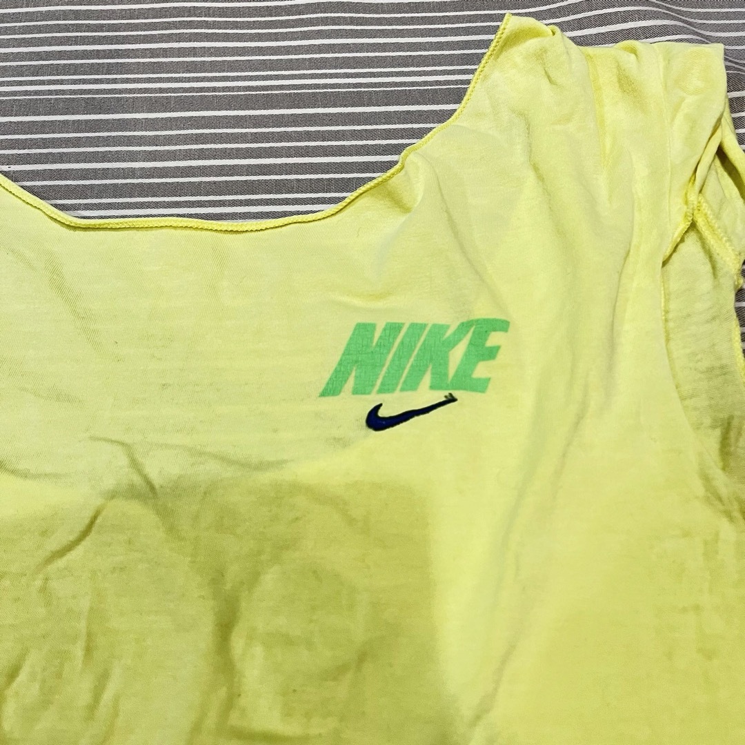 NIKE(ナイキ)のNIKE タンクトップ　M イエロー　スポーツ レディースのトップス(タンクトップ)の商品写真