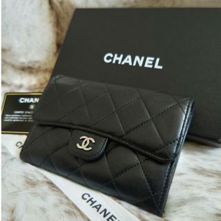 CHANEL - シャネル ココマーク ココボタン 二つ折り財布 長財布 レザー