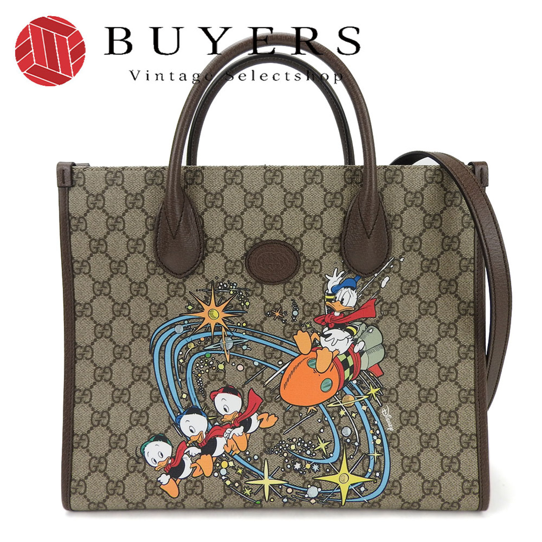 Gucci(グッチ)の【中古】 グッチ  2WAY ハンドバッグ ショルダー 肩掛け 648134 GGスプリーム ドナルドダック ディズニーコラボ レザー PVC ベージュ ブラウン レディース 女性 GUCCI hand bag shoulder beige brown Donaldduck レディースのバッグ(ハンドバッグ)の商品写真