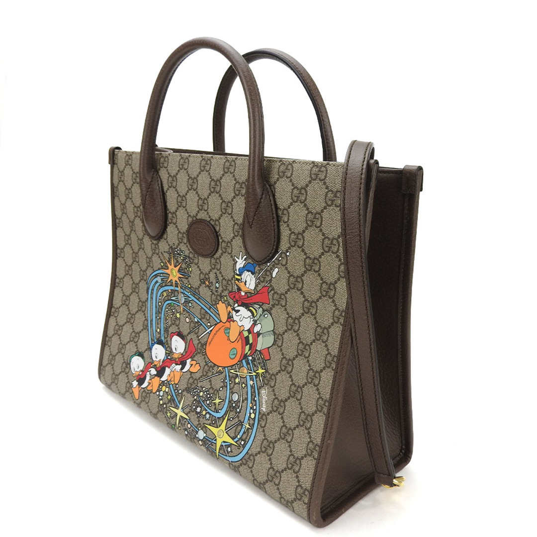 Gucci(グッチ)の【中古】 グッチ  2WAY ハンドバッグ ショルダー 肩掛け 648134 GGスプリーム ドナルドダック ディズニーコラボ レザー PVC ベージュ ブラウン レディース 女性 GUCCI hand bag shoulder beige brown Donaldduck レディースのバッグ(ハンドバッグ)の商品写真