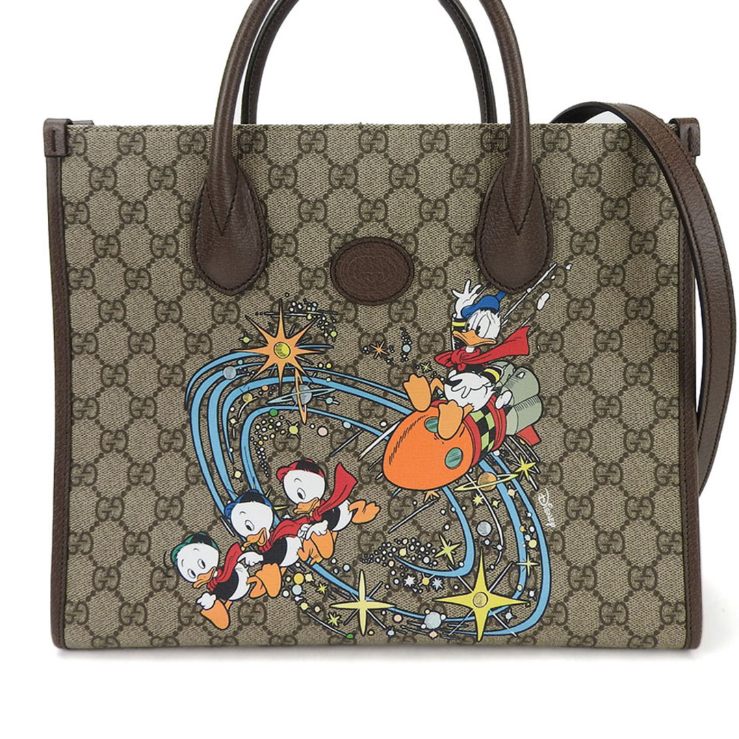 Gucci(グッチ)の【中古】 グッチ  2WAY ハンドバッグ ショルダー 肩掛け 648134 GGスプリーム ドナルドダック ディズニーコラボ レザー PVC ベージュ ブラウン レディース 女性 GUCCI hand bag shoulder beige brown Donaldduck レディースのバッグ(ハンドバッグ)の商品写真