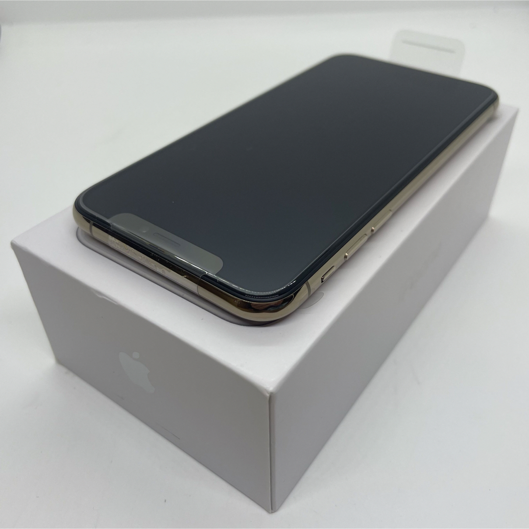 iPhone(アイフォーン)の【新品】iPhone Xs ゴールド 64 GB SIMフリー 本体 スマホ/家電/カメラのスマートフォン/携帯電話(スマートフォン本体)の商品写真