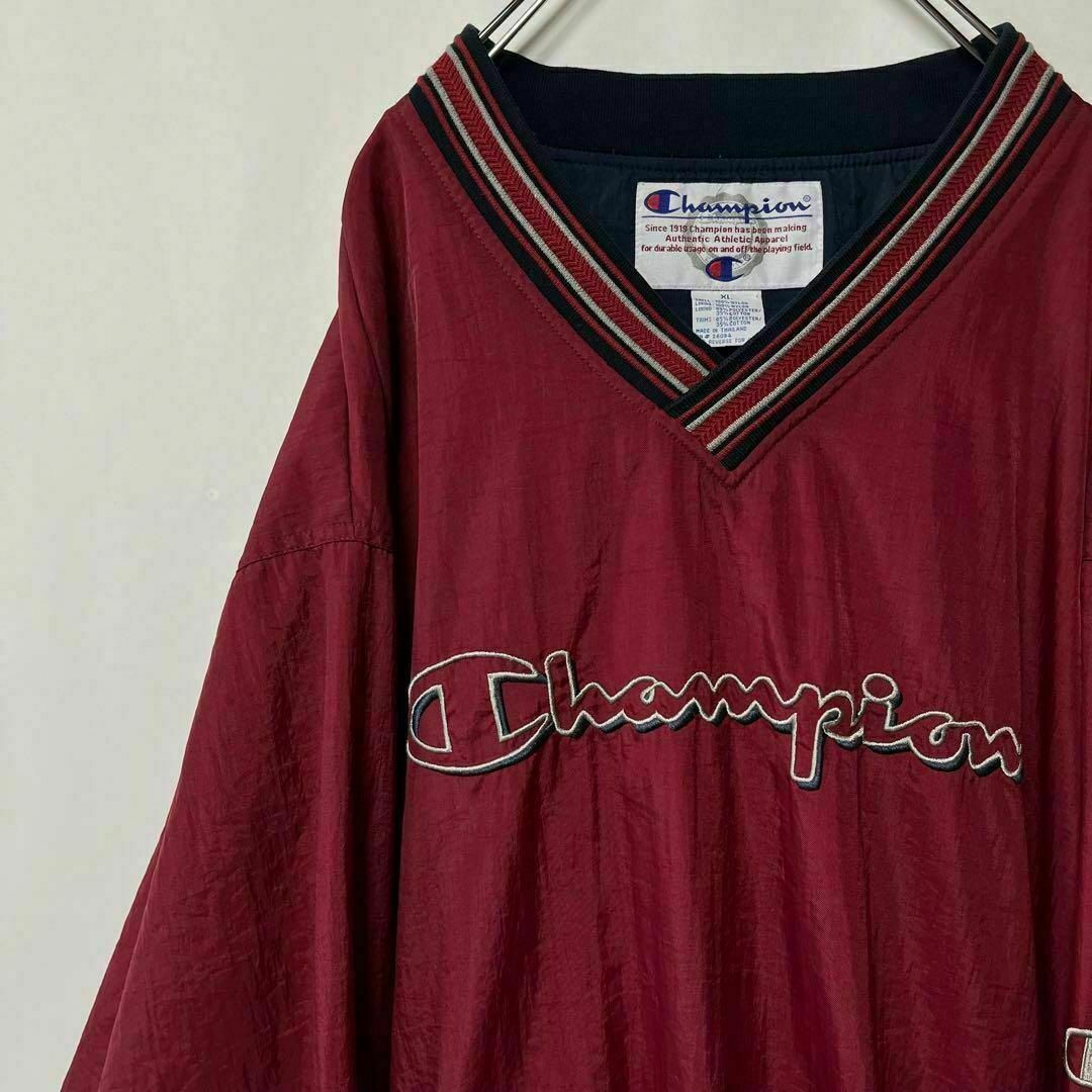 Champion(チャンピオン)のチャンピオン　ナイロンプルオーバージャケット　ビッグロゴ　ゲームシャツ　XL メンズのジャケット/アウター(ナイロンジャケット)の商品写真