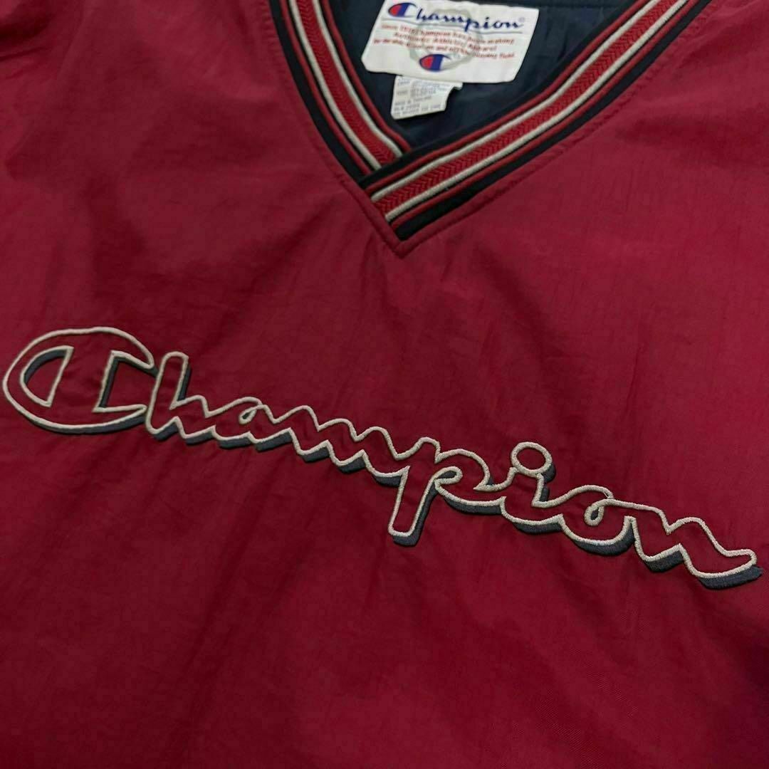 Champion(チャンピオン)のチャンピオン　ナイロンプルオーバージャケット　ビッグロゴ　ゲームシャツ　XL メンズのジャケット/アウター(ナイロンジャケット)の商品写真