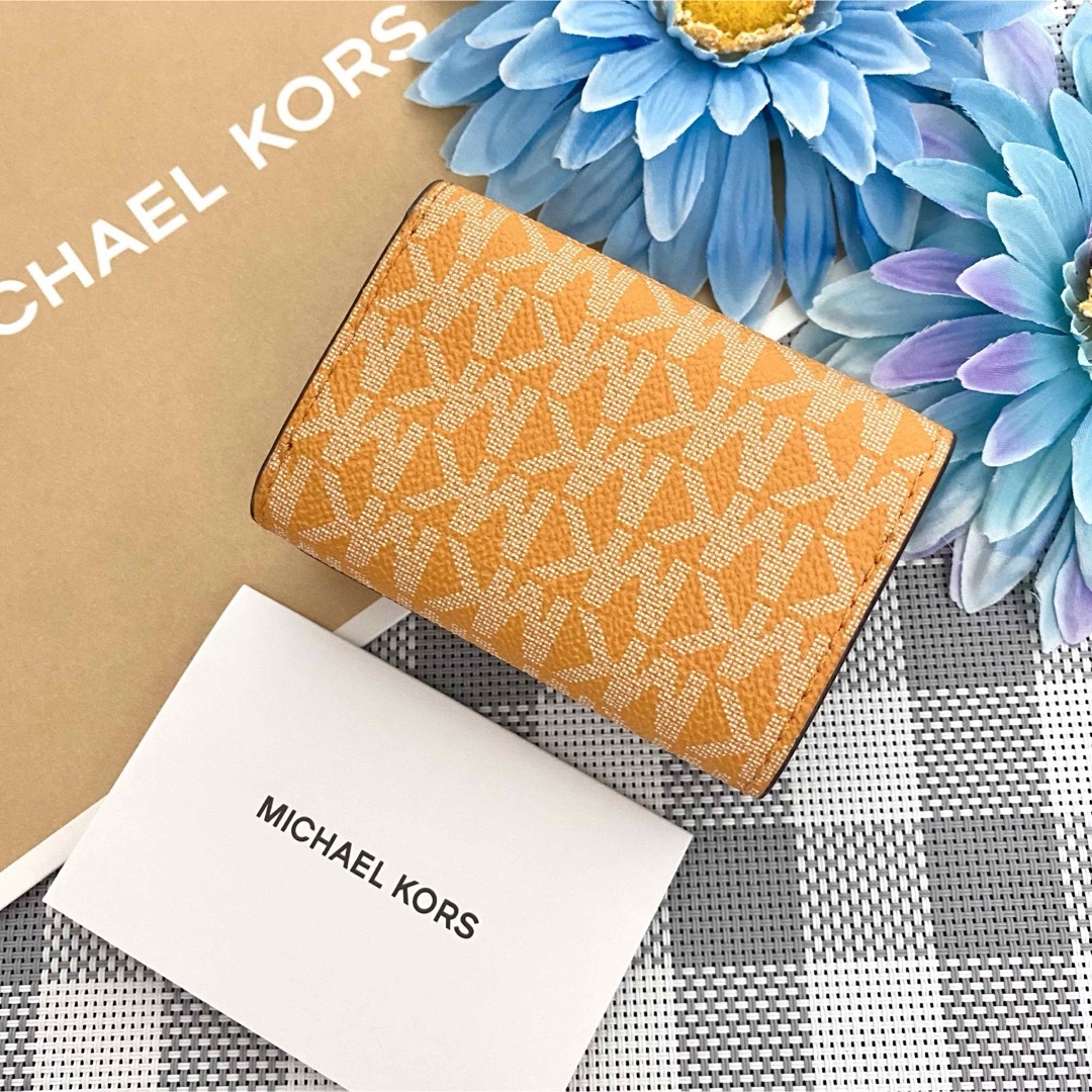 Michael Kors(マイケルコース)の【新品】MICHAEL KORS イエロー シグネチャー レザー 折り財布 レディースのファッション小物(財布)の商品写真