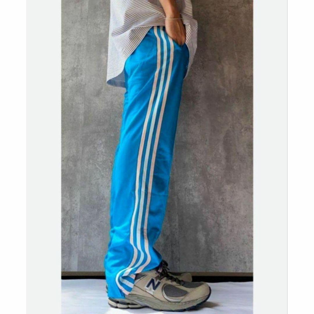 adidas(アディダス)のアディダス 薄青 ファイヤーバード スリット ユニセックス ジャージ 女性XOT レディースのパンツ(その他)の商品写真