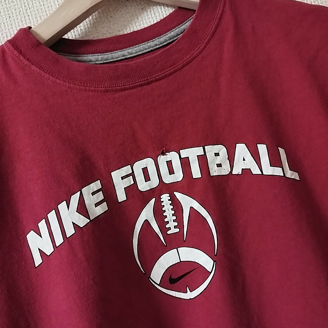 NIKE(ナイキ)のUSA古着 NIKE ナイキ　ロンT　赤　L(14-16)　FOOTBALL キッズ/ベビー/マタニティのキッズ服男の子用(90cm~)(Tシャツ/カットソー)の商品写真