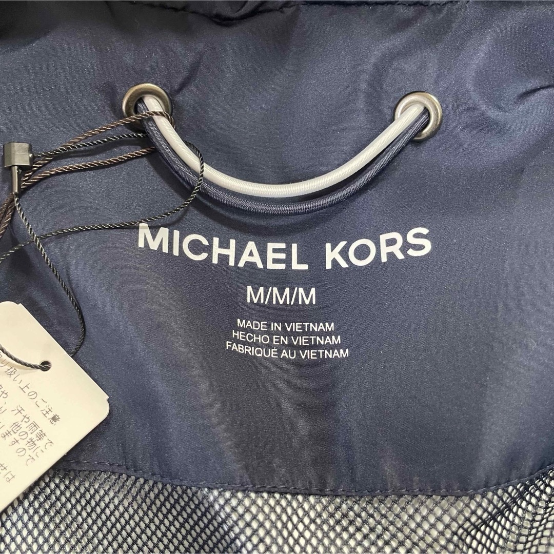Michael Kors(マイケルコース)の【未使用・タグ付き】MICHAEL KORS  ブルゾン　総柄　リバーブルー　M レディースのジャケット/アウター(ブルゾン)の商品写真