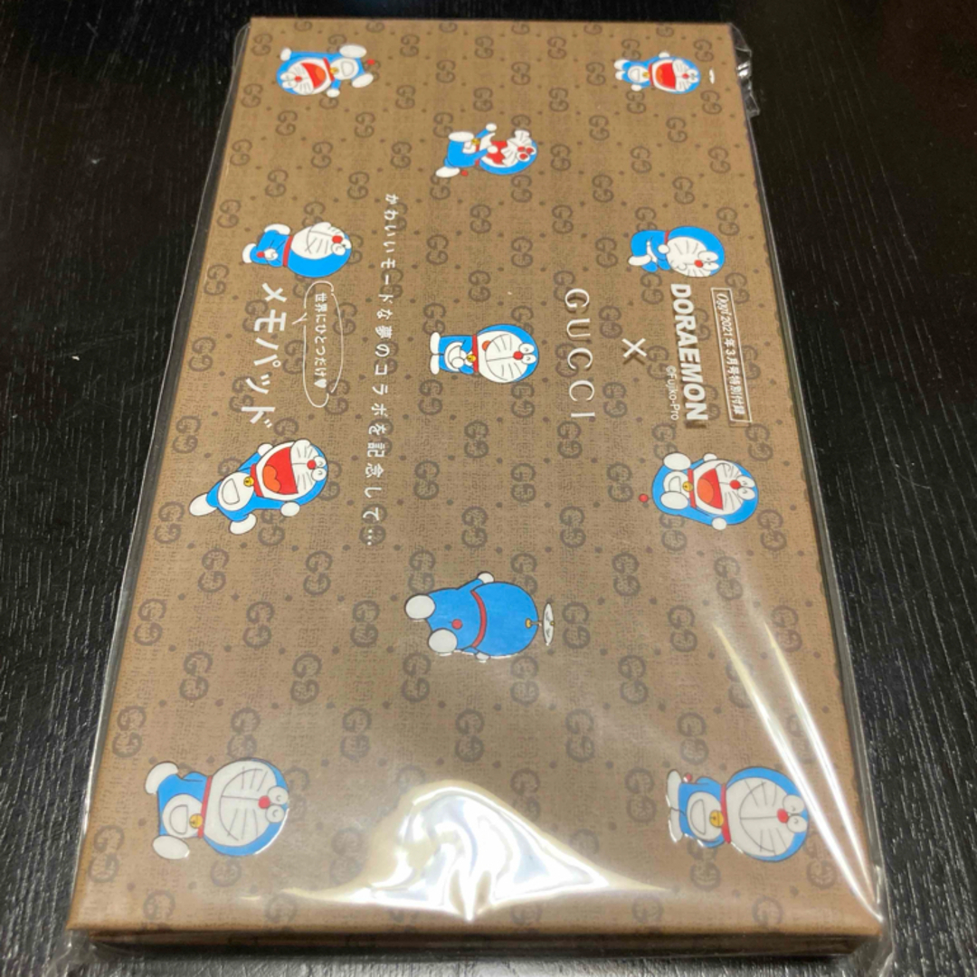 Gucci(グッチ)の新品　DORAEMON×GUCCI Oggi特製メモパッド インテリア/住まい/日用品の文房具(ノート/メモ帳/ふせん)の商品写真