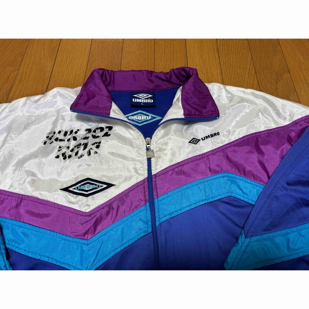 UMBRO(アンブロ)のumbro 90s トラックジャケット　デカタグ　サイズL ブルー　ハイネック メンズのトップス(ジャージ)の商品写真