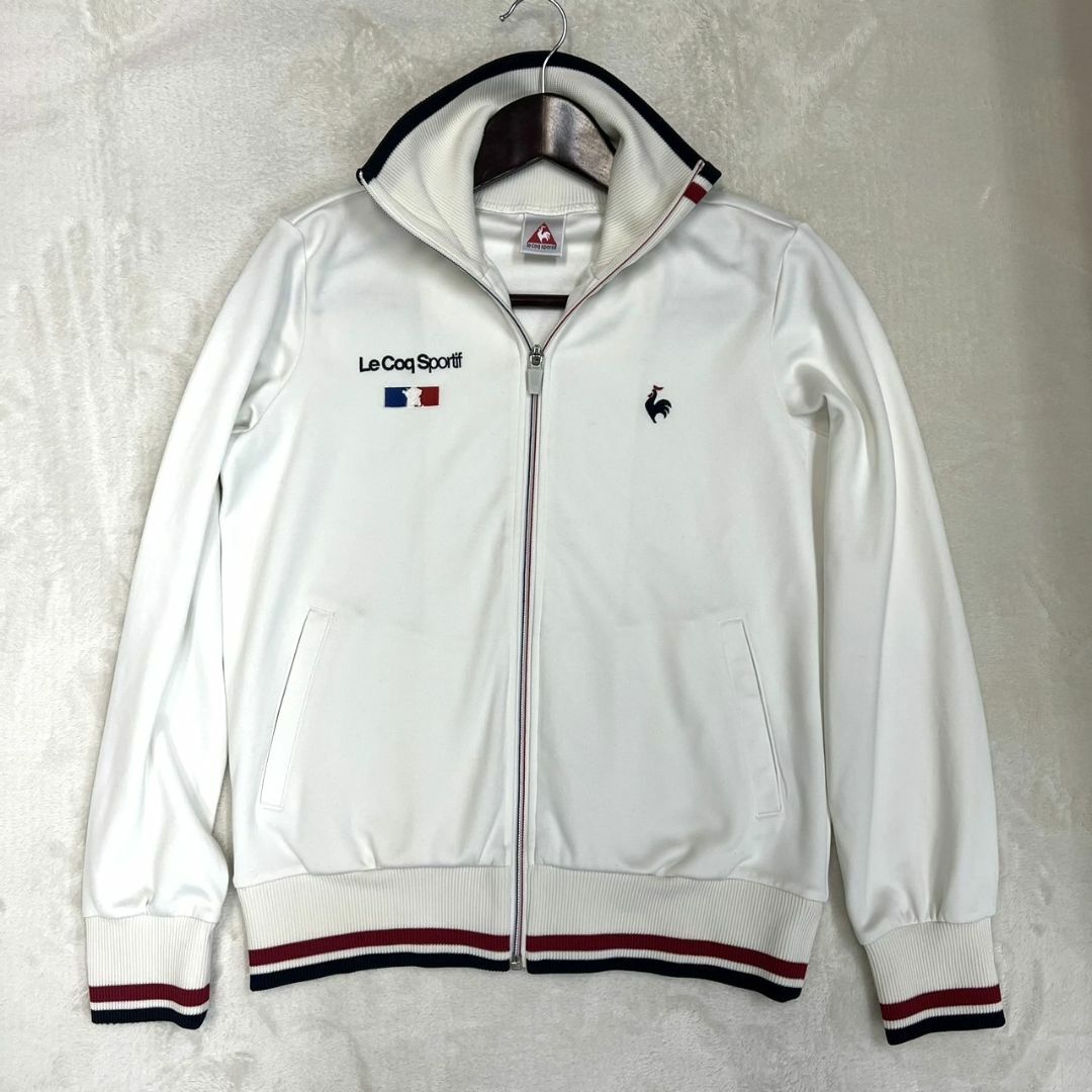 le coq sportif(ルコックスポルティフ)の【ルコックスポルティフ トラックジャケットジャージ レディースＭ ホワイト】 スポーツ/アウトドアのゴルフ(ウエア)の商品写真