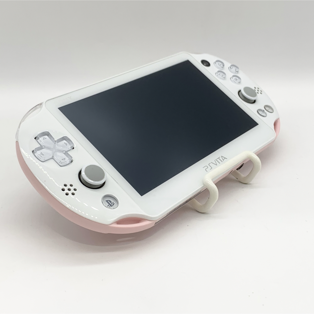 PlayStation Vita(プレイステーションヴィータ)の【液晶美品】PSvita ライトピンク ホワイト PCH-2000 本体 動作品 エンタメ/ホビーのゲームソフト/ゲーム機本体(携帯用ゲーム機本体)の商品写真